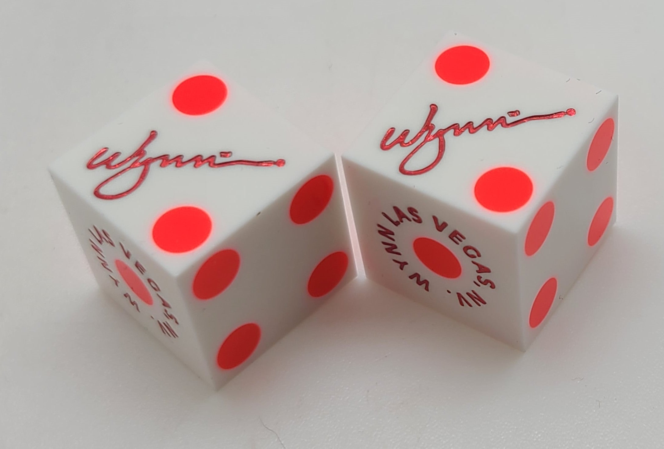 Wynn Hotel and Casino Las Vegas Nevada White/Neon Orange Dice Pair Matching Logos