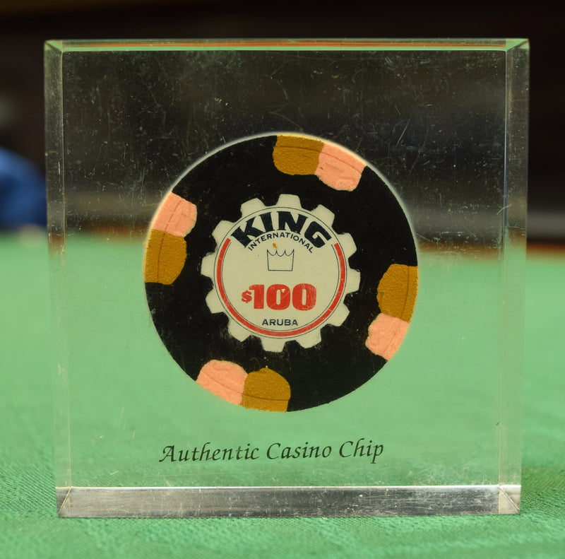 King International Casino Aruba $100 Chip in Lucite Paperweight